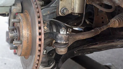 Worn Steering Knuckle Symptoms That Compromise Alignment and Tire Wear